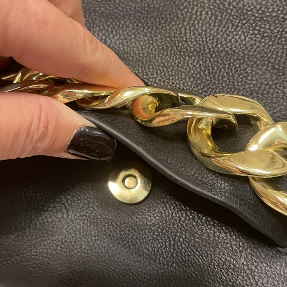 H & M black crossbody with bold gold chain front accent. - Picture 7 of 11